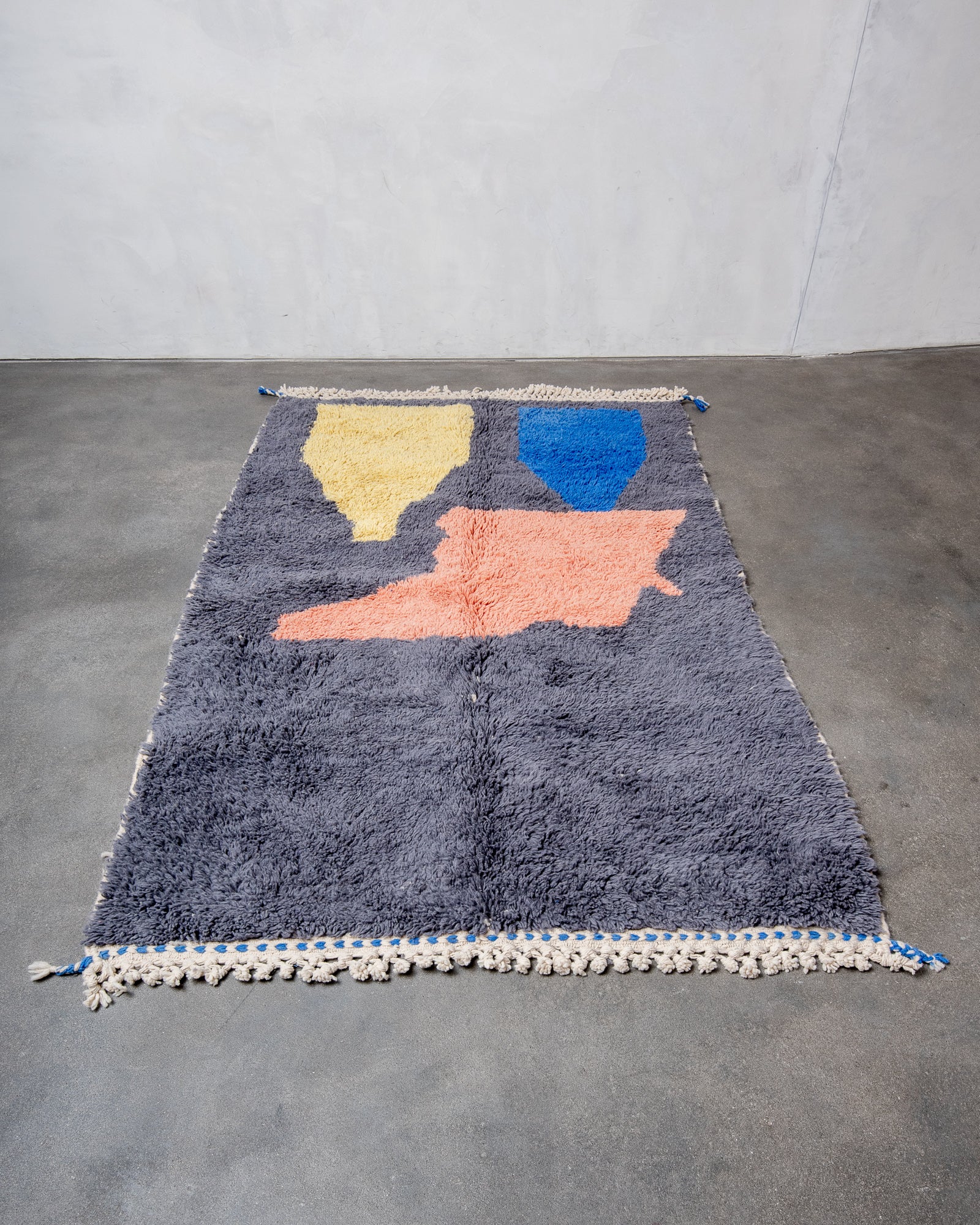 Modern, designer, handcrafted Berber rug from Morocco. Beniourain carpet with beautiful colours and patterns and fluffy wool texture.